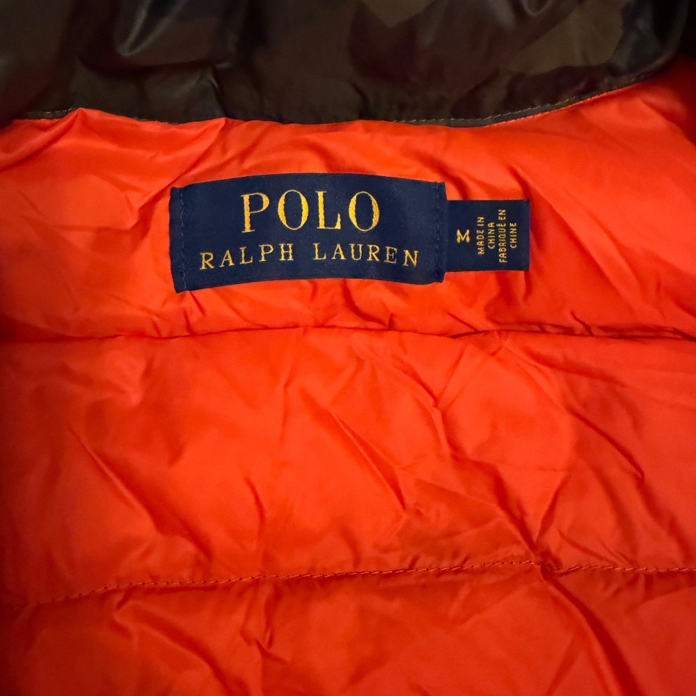The Polo Ralph Lauren Camo/Orange Puffer Vest is a stylish and practical outerw - Picture 9 of 10
